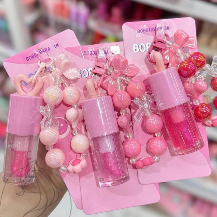 LIP GLOSS SHINE BRIHO LABIAL COM PULSEIRA CHAVEIRO BOBBI